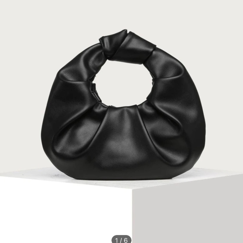 Brand new black minimalist touched hand bag purse